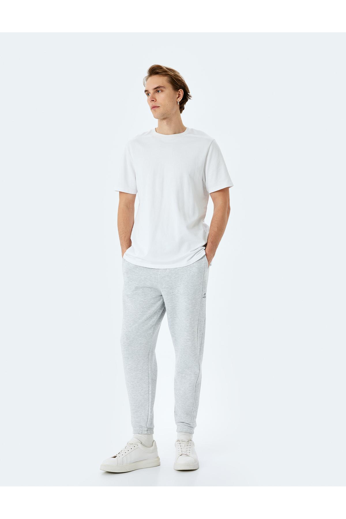 شلوار دوخت جیبی پنبه ای با دوخت کشدار